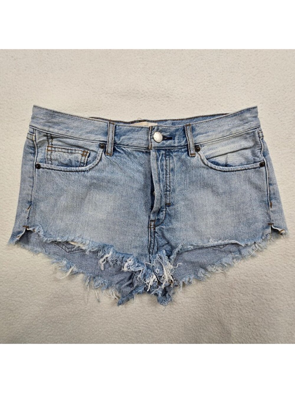 We The Free People Size 27 Denim Cutoff Fringe Shorts Blue Button Fly Raw Hem